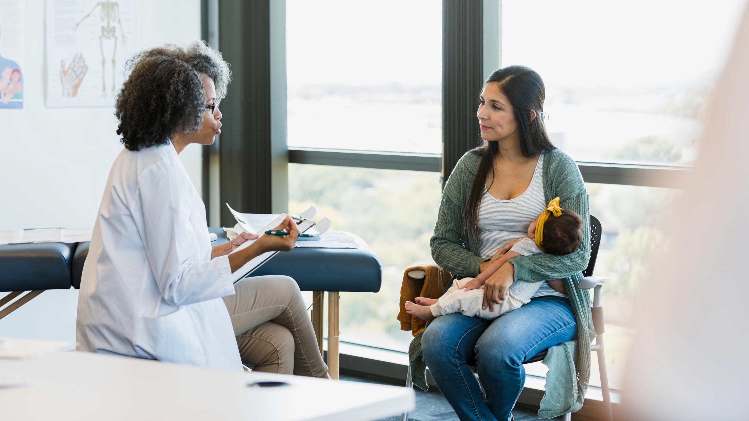 Doctor talks with patient