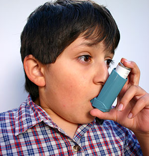 boy using an inhaler