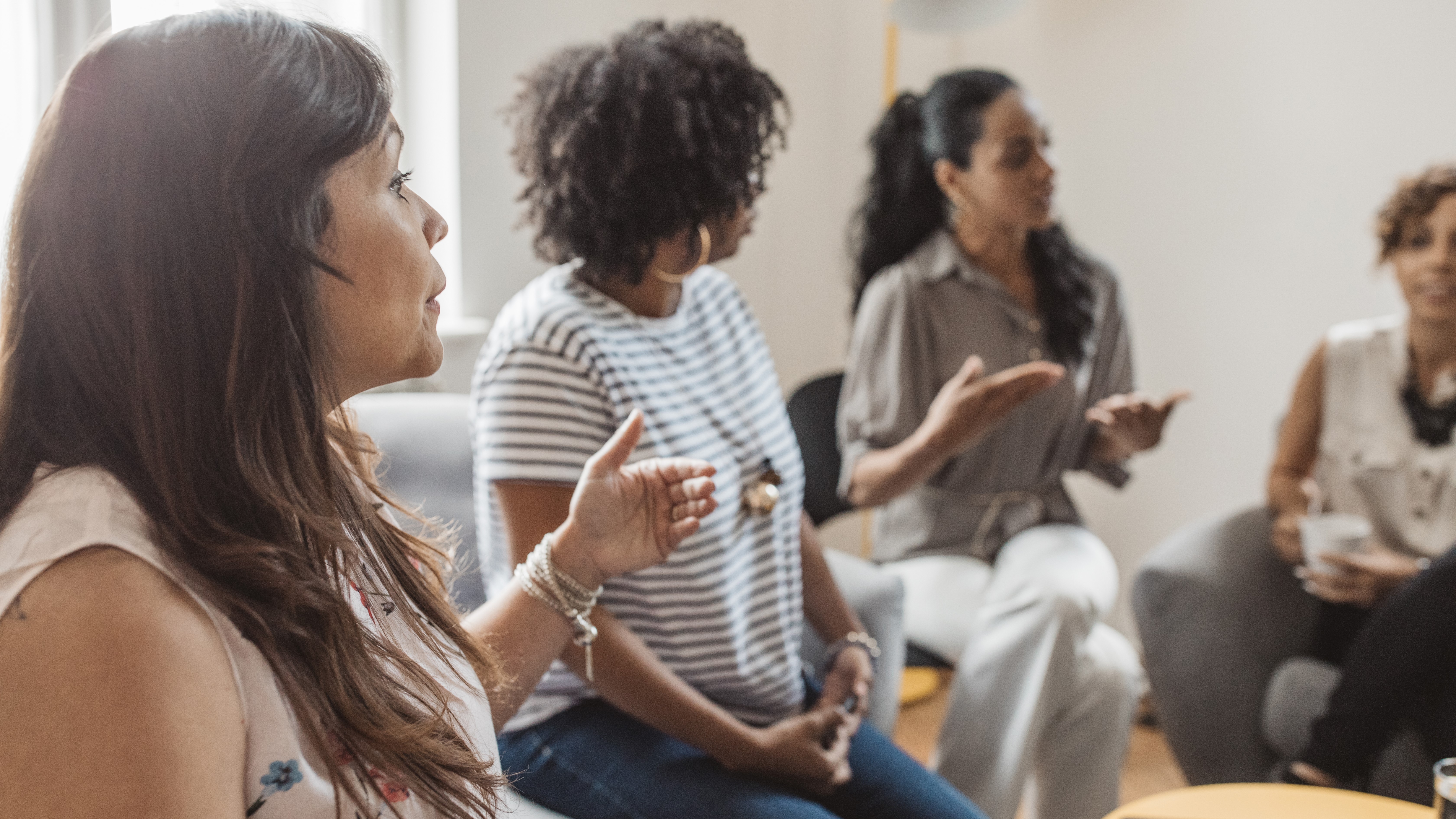 Coworking women in a business meeting.