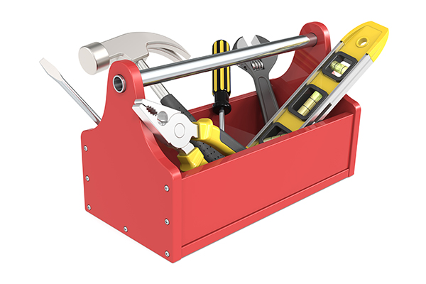 Red toolbox filled with tools