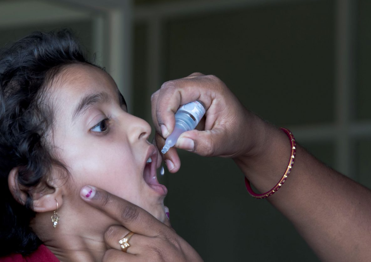 A polio immunization drop given to a child.
