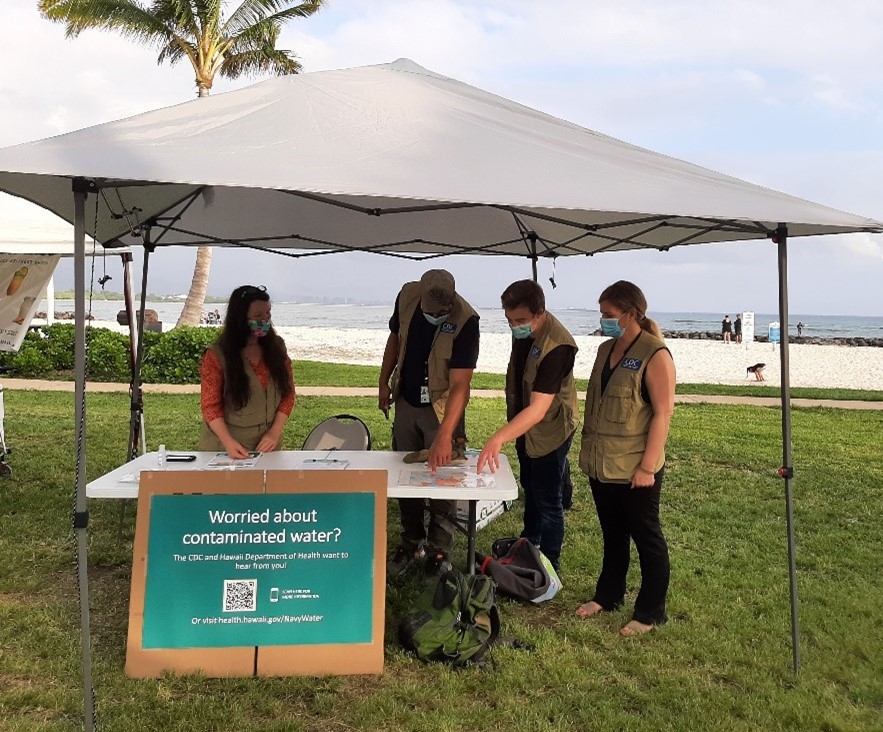 ATSDR Workers at an outdoor booth in Hawaii.